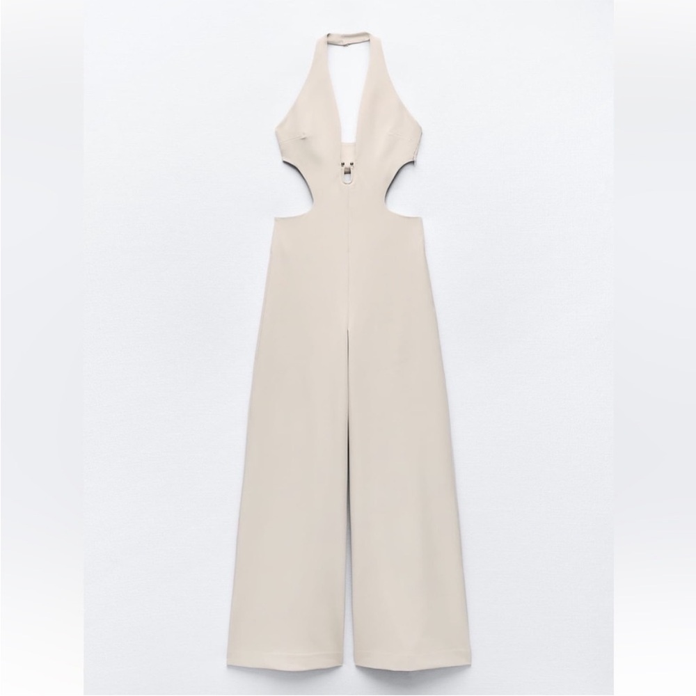 New! Zara beige/sand halter jumpsuit with side cut outs in medium.